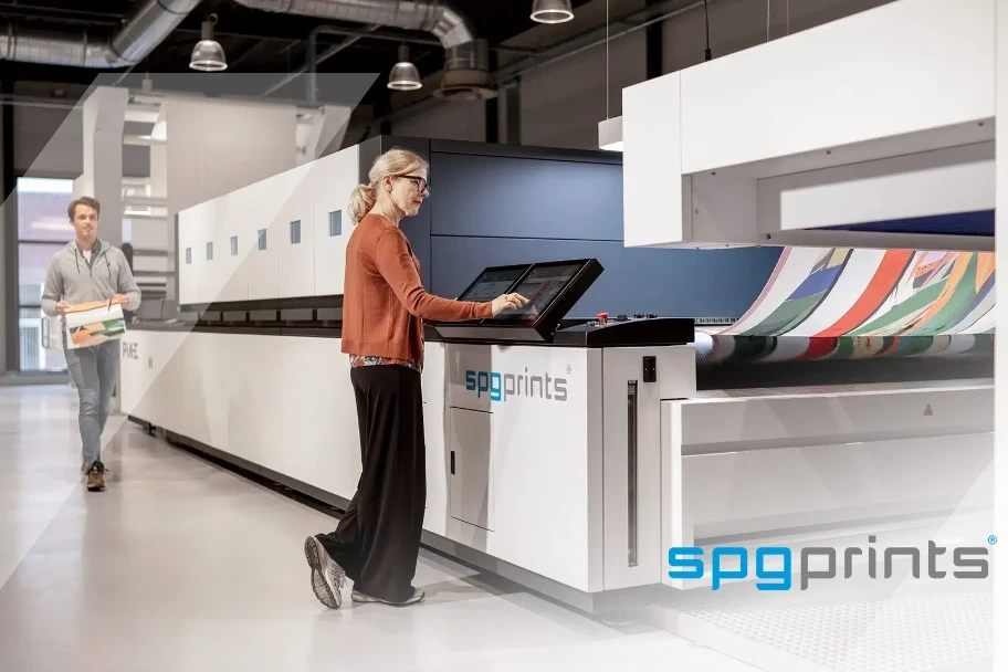 people working on a printer
